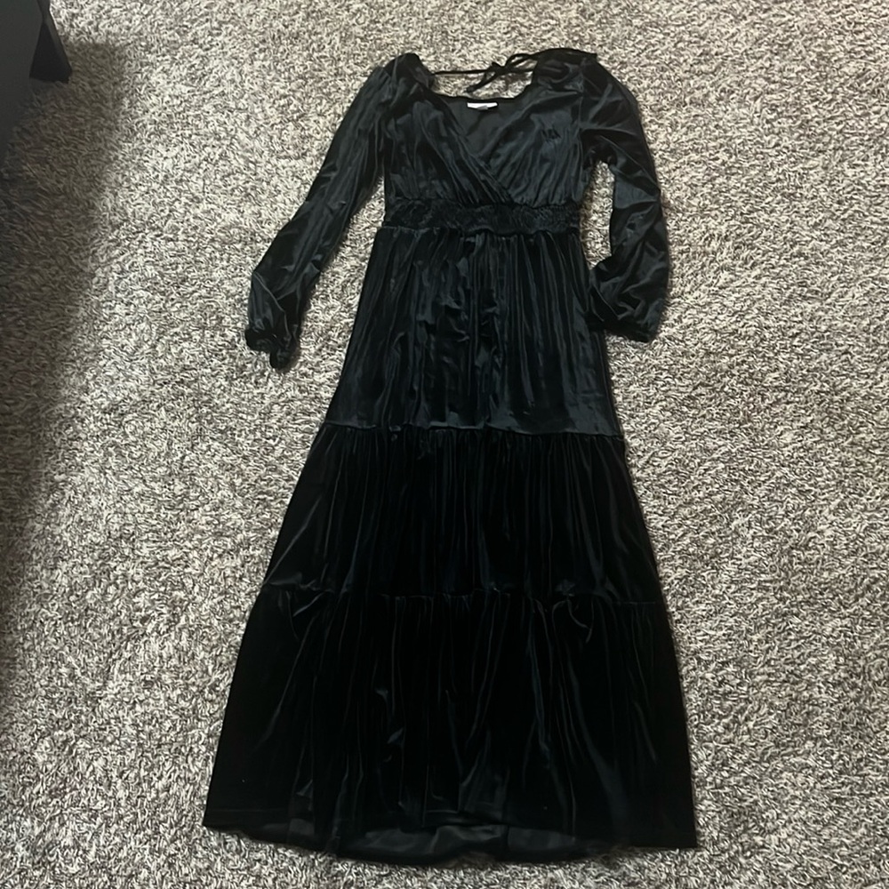 Woman’s black velvet maxi dress